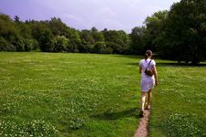 Girl Walking Through Meadow Royalty Free Stock Photography Girl Walking Through Meadow Royalty Free Stock Photography