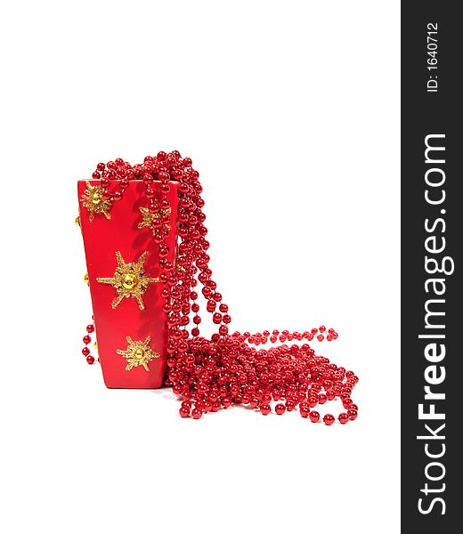 Red Christmas Decorations In Beautiful Vase Over White