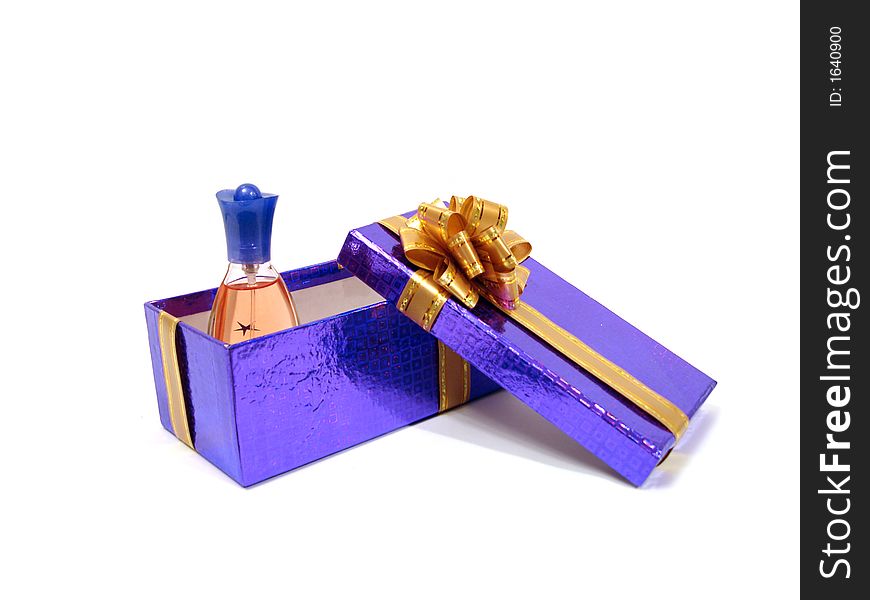 Bottle Of Perfume On Congratulatory Violet Box Over White Backgr