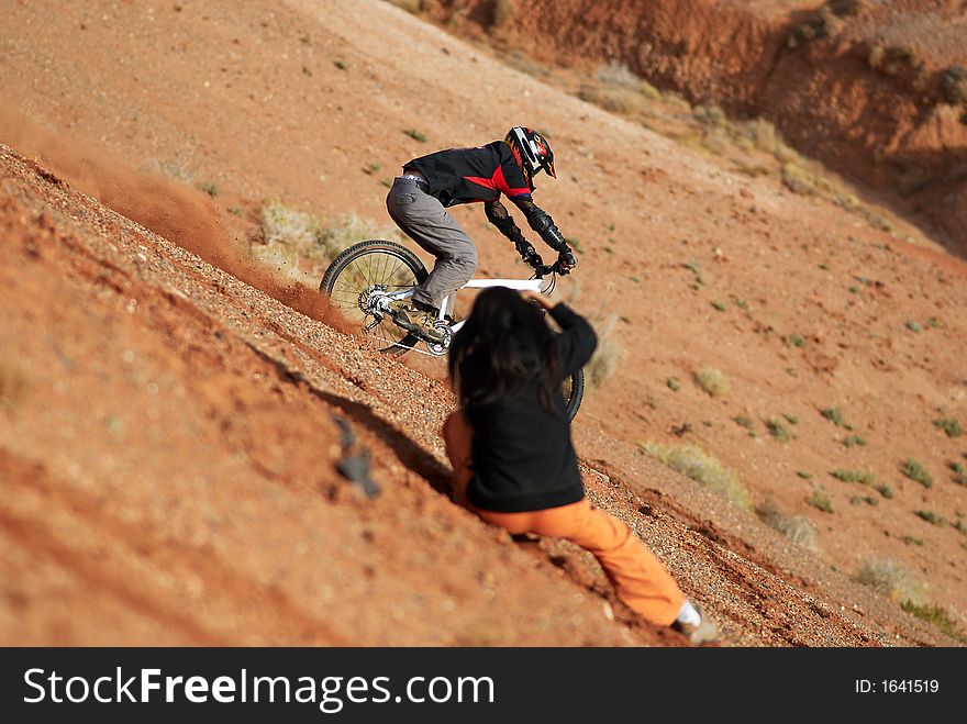 Extreme bike photosession in red canyon