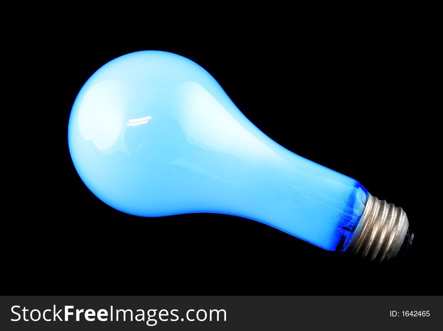 Bright Blue Light Bulb on Isolated Black Background