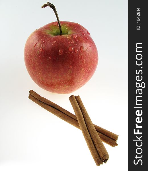 Apple  and two sticks of  cinnamon. Apple  and two sticks of  cinnamon