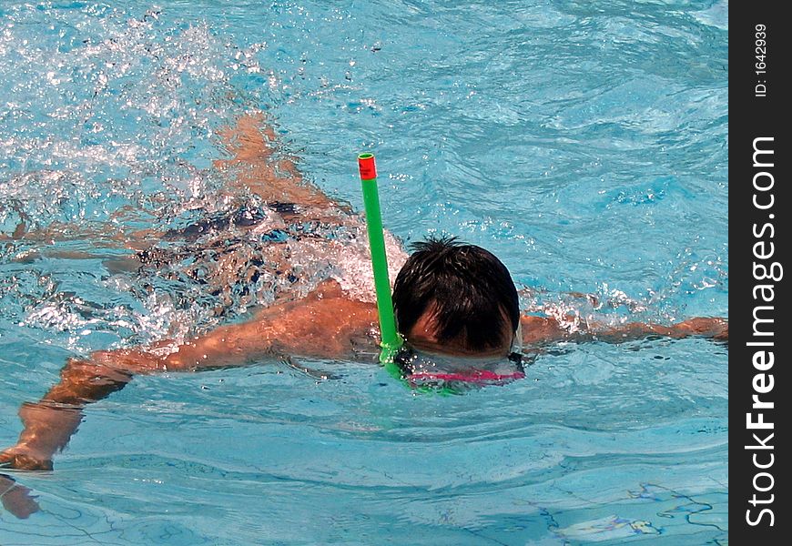 Action in water - Man swiming in pool. Action in water - Man swiming in pool