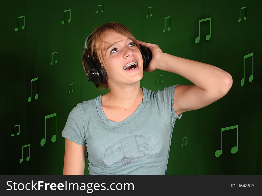 Teen girl listens to her favorite music. Teen girl listens to her favorite music