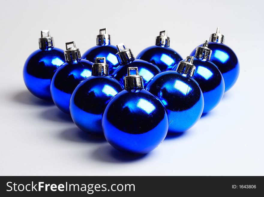 Christmas ornaments lined up in a row
