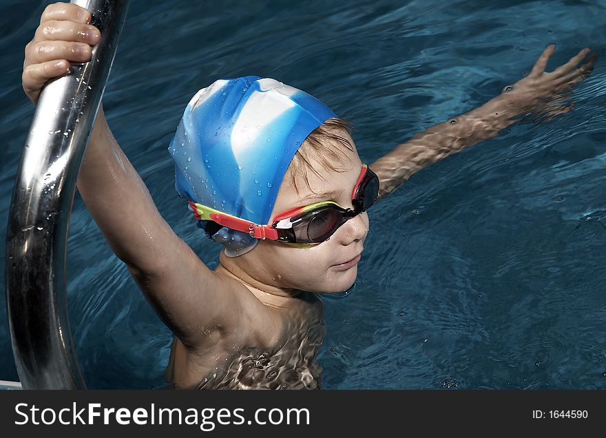 Small boy in swimming pool. Small boy in swimming pool