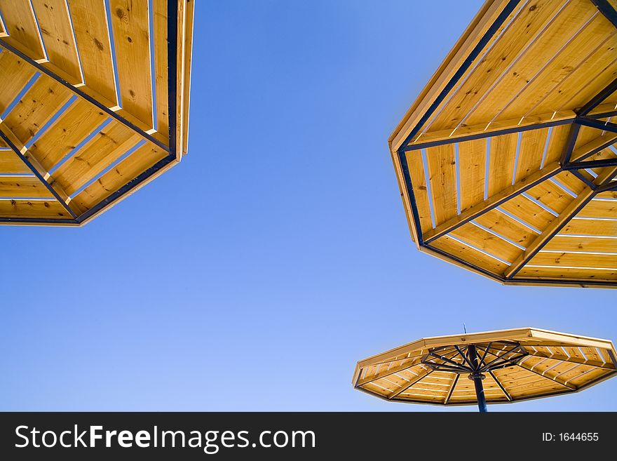 Parasols on a background of the sky