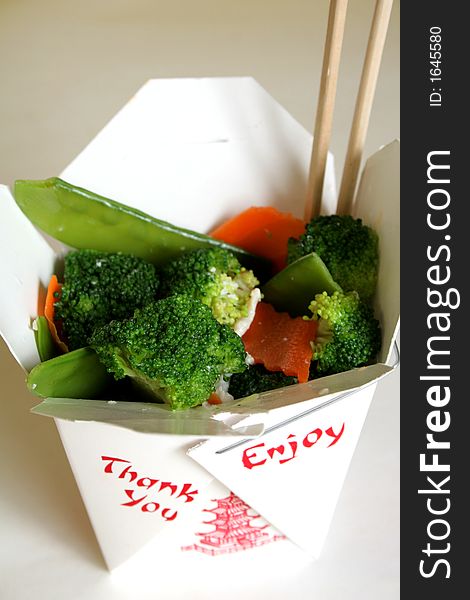 Chinese vegetables upclose with chopsticks
