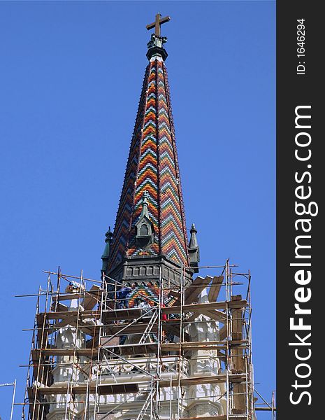 Photo of scaffold around a cathedral steeple. Photo of scaffold around a cathedral steeple