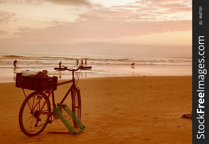 Sunset beach in europe country with bike wallpaper