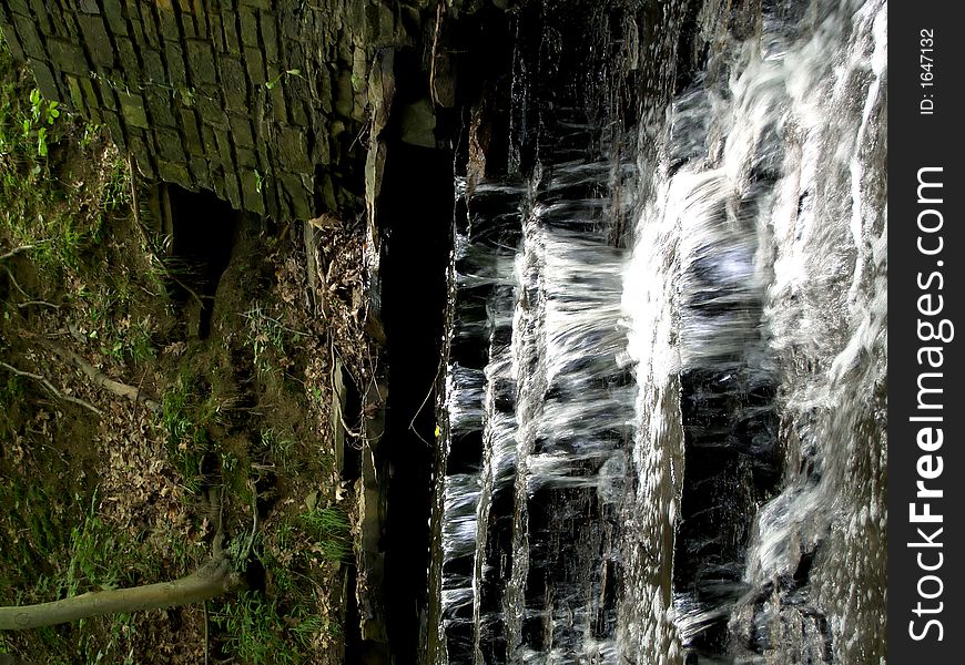 Small waterfall over slate and shale in the forest. Small waterfall over slate and shale in the forest