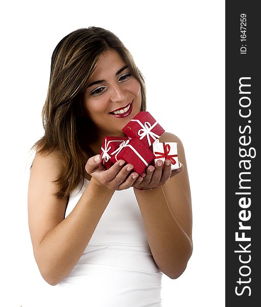 Christmas season! Different poses of a beautiful woman with small gifts on the hands.  (Focus is on the gifts). Christmas season! Different poses of a beautiful woman with small gifts on the hands.  (Focus is on the gifts)