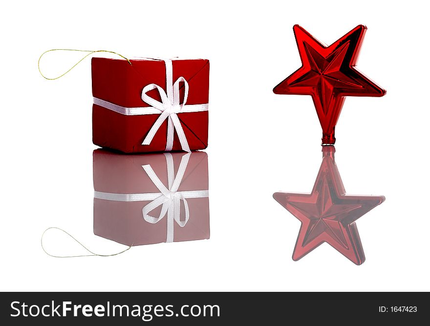 Photo of red Christmas ornaments with reflection