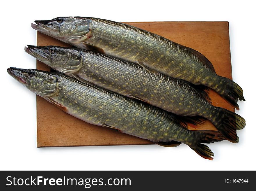 Two pikes for preparation of a fish soup. Two pikes for preparation of a fish soup