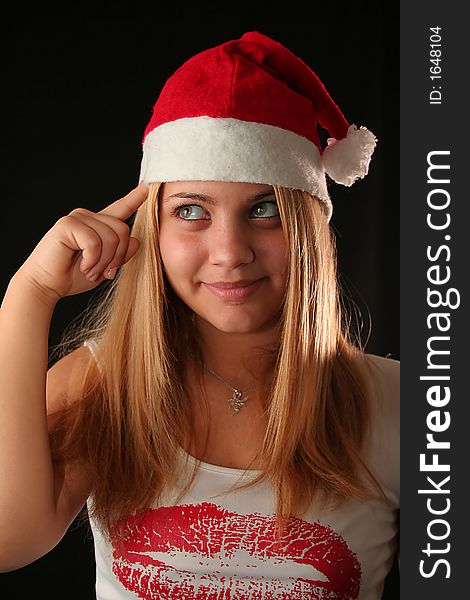 Attitude Christmas blonde girl, black background. Attitude Christmas blonde girl, black background