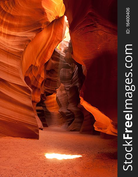 A photo of light beam taken in lower antilope canyon. A photo of light beam taken in lower antilope canyon