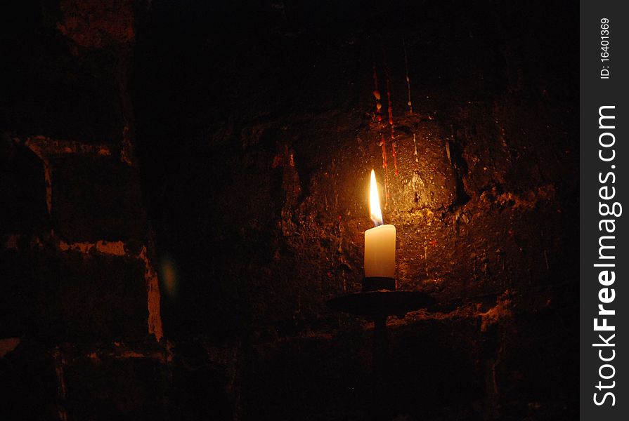 Macro shot of a burning candle & glowing light. Macro shot of a burning candle & glowing light