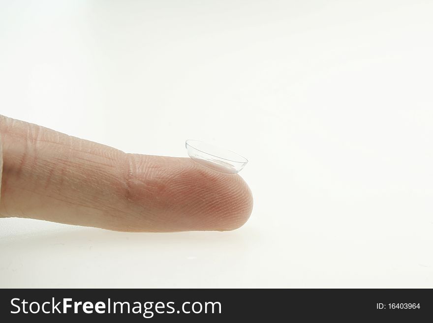 Contact Lens on a finger isolated