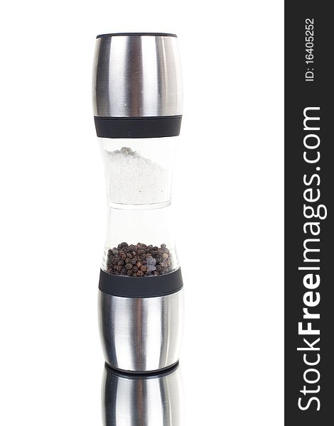 Series. A glass grinder of pepper isolated on a white background