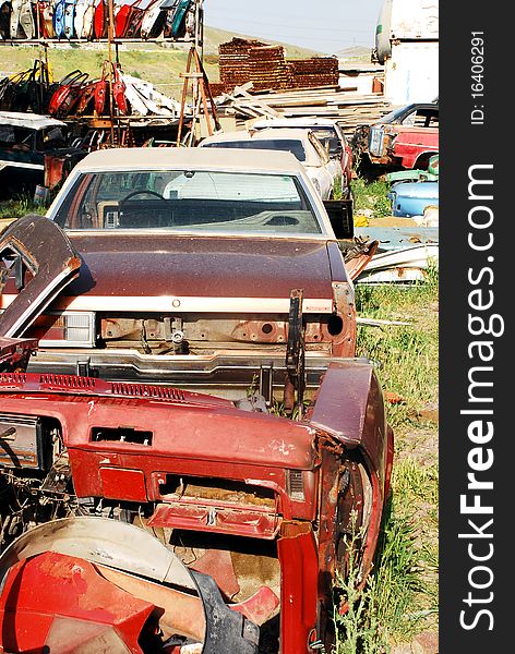 Vintage cars abandoned and rusting away in rural wyoming. Vintage cars abandoned and rusting away in rural wyoming