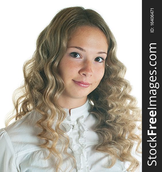 Portrait of the young smiling girl on white background. Isolation