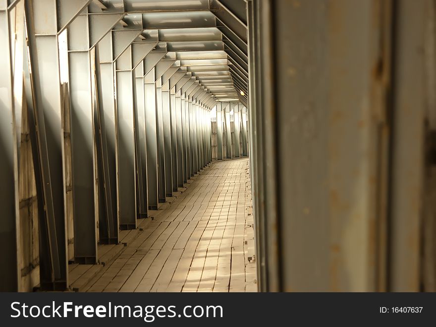 Long corridor with light lines inside .