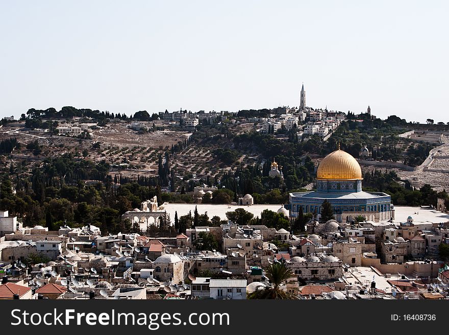 The Old City of Jerusalem, punctuated by the Dome of the Rock, with the Mount of Olives in the background. The Old City of Jerusalem, punctuated by the Dome of the Rock, with the Mount of Olives in the background.