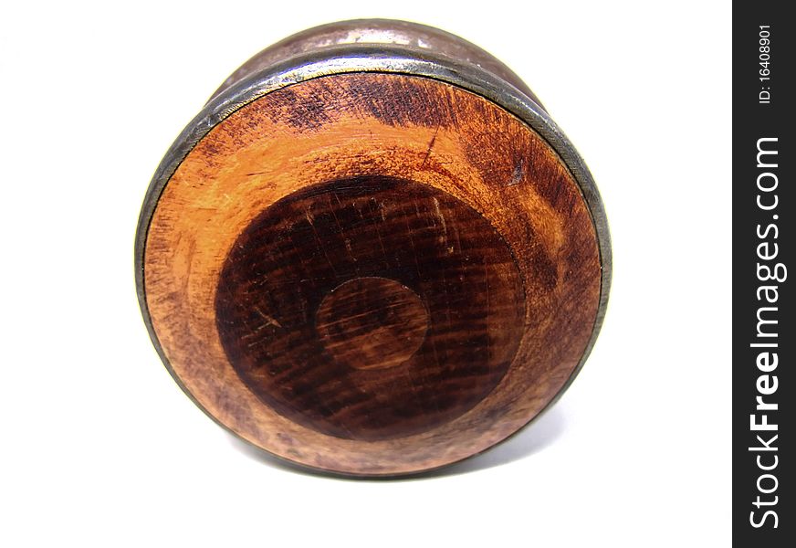 A wood and metal yo-yo on a white background. A wood and metal yo-yo on a white background.