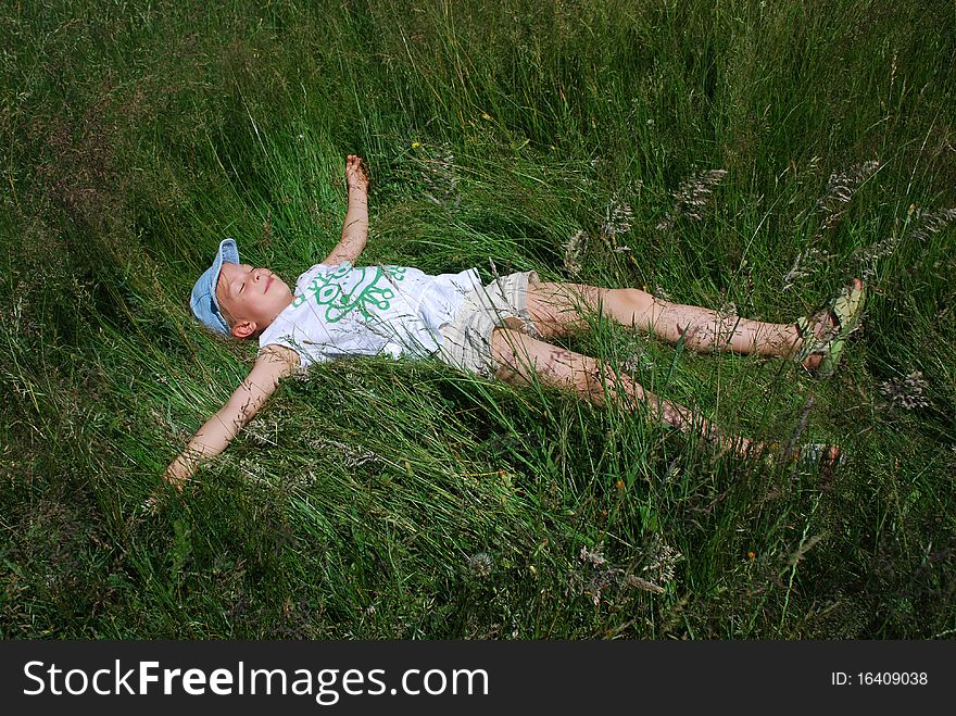Girl Resting In Meadow