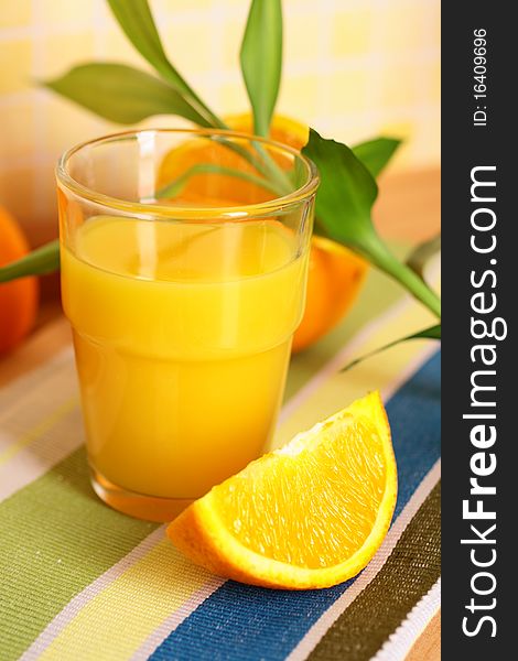 Glass with sweet orange juice. Glass with sweet orange juice