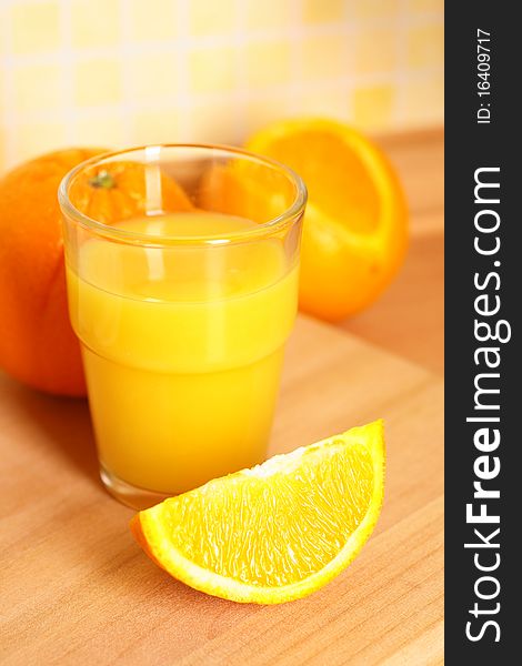 Glass with sweet orange juice. Glass with sweet orange juice