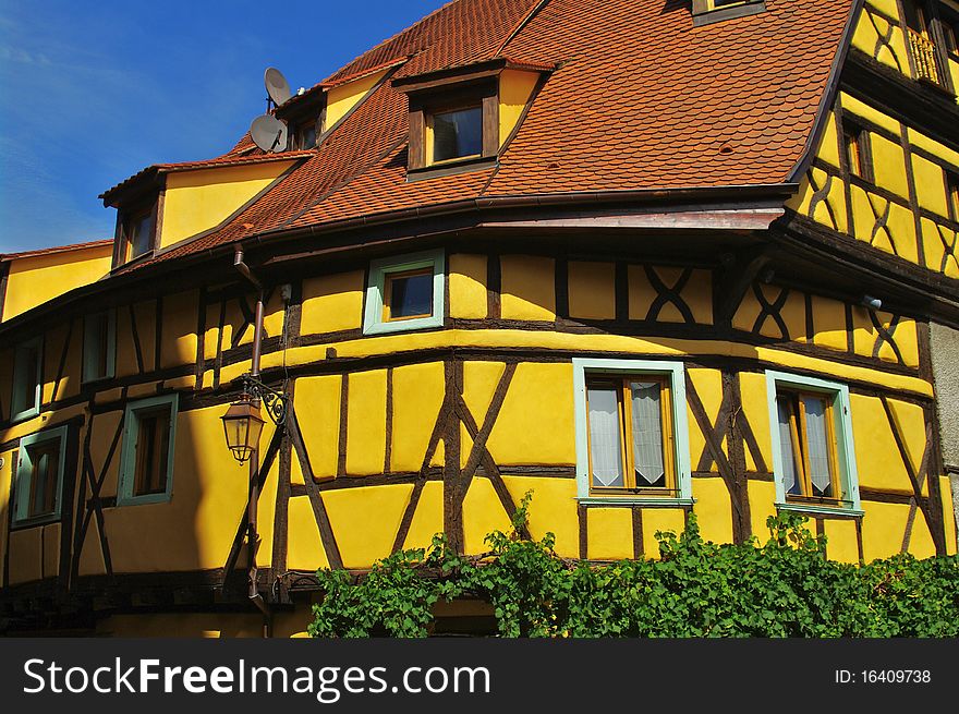 Yellow traditional house in alsace in france