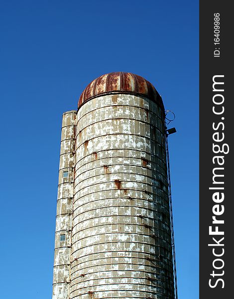 A silo against blue sky