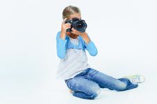 Girl With A Camera Big Lens. Royalty Free Stock Photos