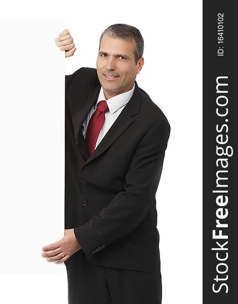 Businessman Holding A Blank Sign In Front Of Him