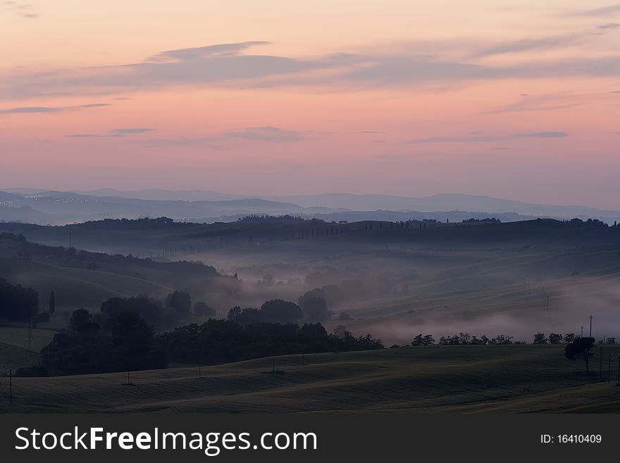 Sunset morning with fog in Tuscany. Sunset morning with fog in Tuscany