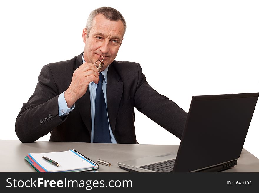 Portrait of senior businessman with notebook isolated on white background