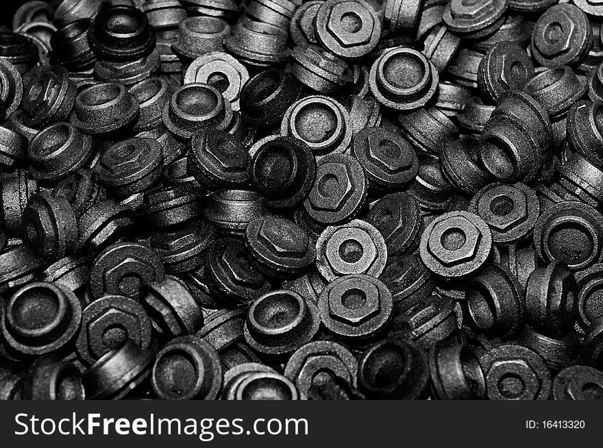 Closeup of steel nuts. Black and white