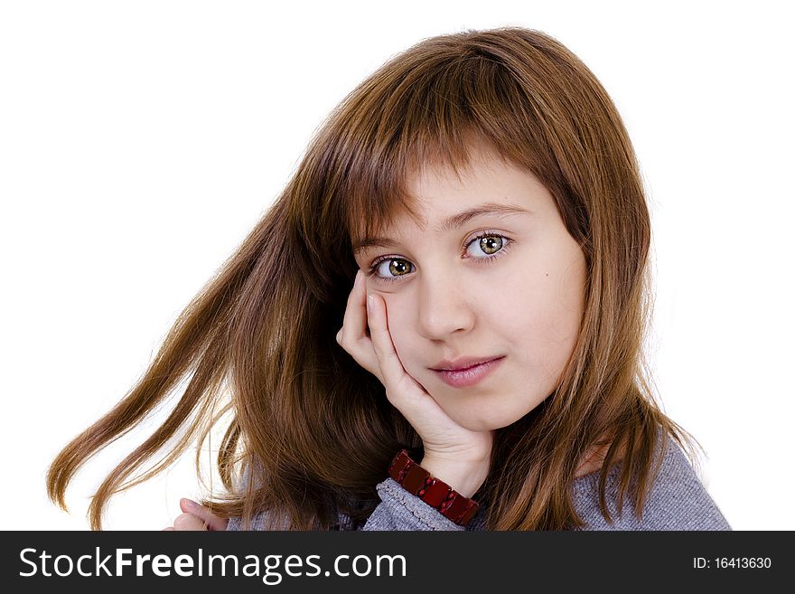 Portrait of a beautiful little girl on a white background