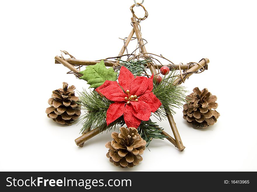 Christmas star of wood with fir cones. Christmas star of wood with fir cones