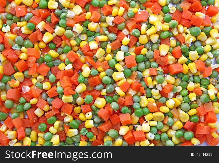 Heap of Chop carrot pea and corn using as background