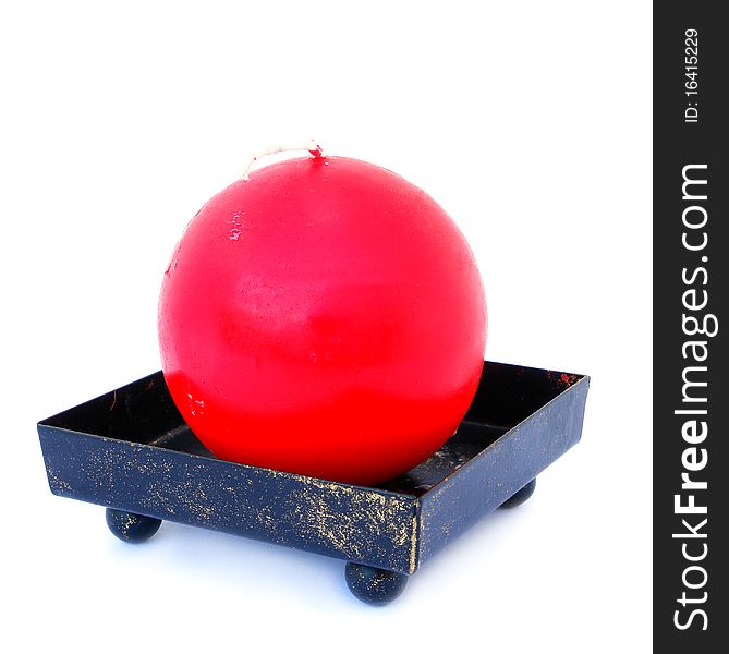 Round red candle isolated on the white background. Round red candle isolated on the white background