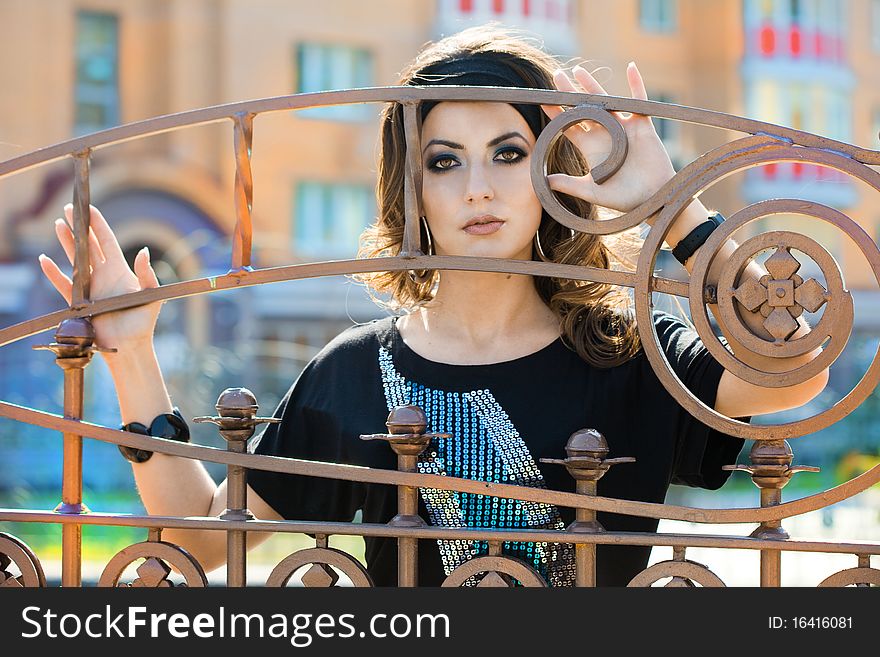 Woman Near The Fence