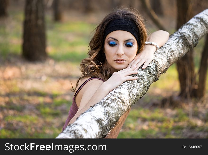Beautiful girl in a birchwood