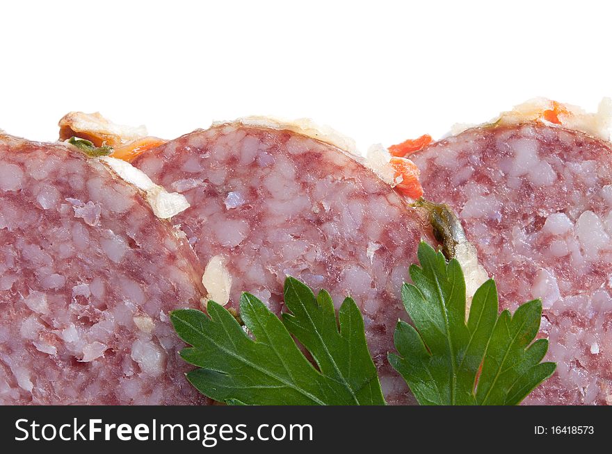 Close up of sliced salami with parsley, isolated on white. Close up of sliced salami with parsley, isolated on white