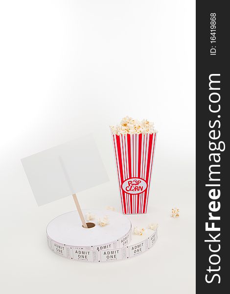 Popcorn, movie tickets and a sign