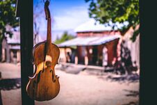 Vintage Violin Infront Of A Old Building Royalty Free Stock Photo