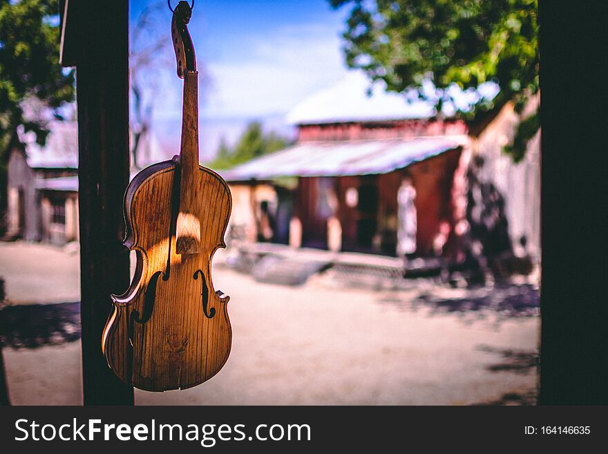 Vintage Violin Infront Of A Old Building