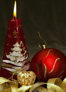 Christmas  Still Life - Red Burning Candle With Ev Royalty Free Stock Photography