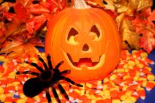 Jack O Lantern With Candy And A Spider Royalty Free Stock Photography Jack O Lantern With Candy And A Spider Royalty Free Stock Photography
